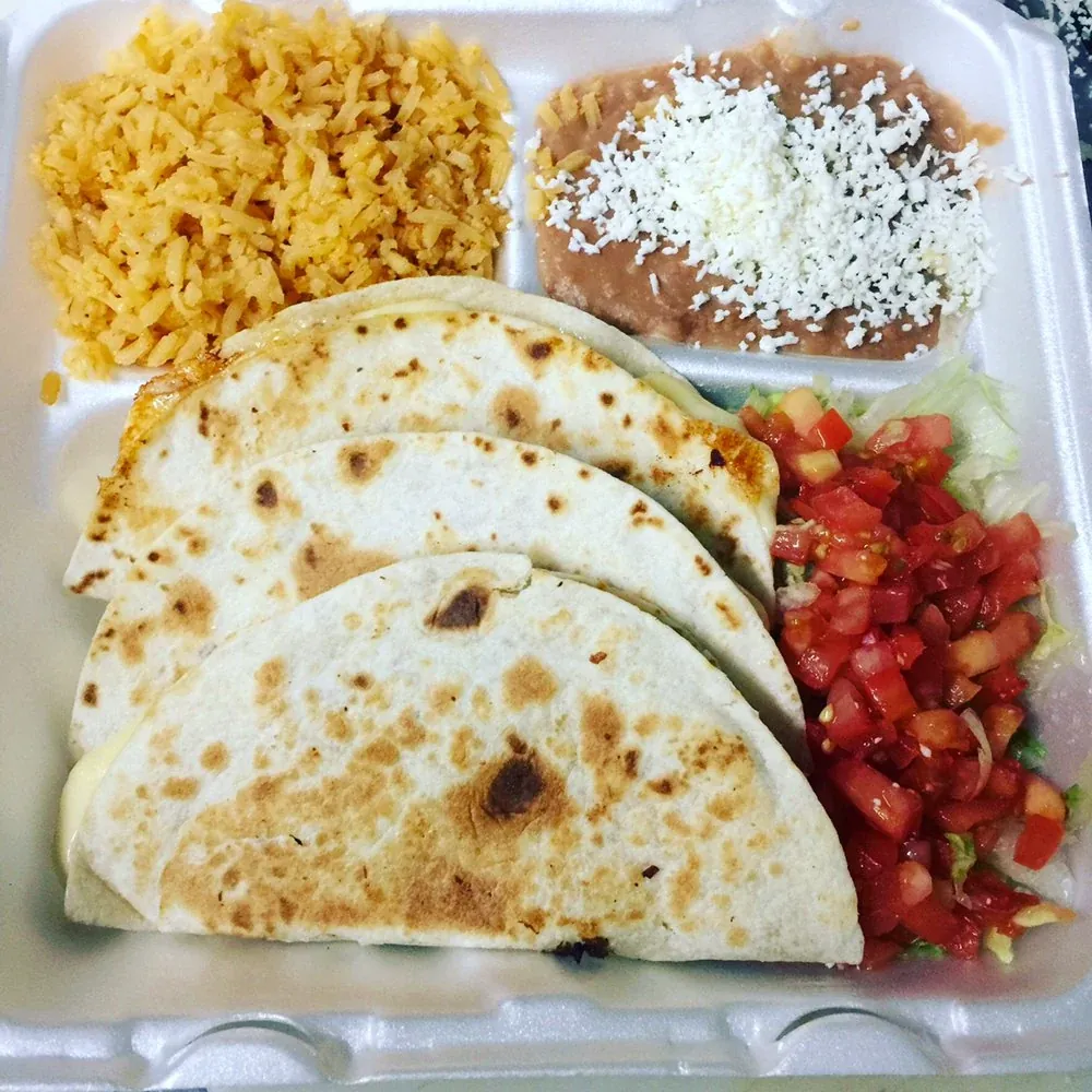 Quesadilla dinner with rice, beans and salad